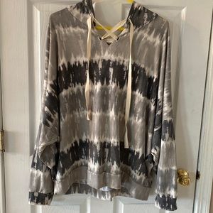 No Brand tag is cut out. Grey/black/cream super soft hoody. Would guess Size XL